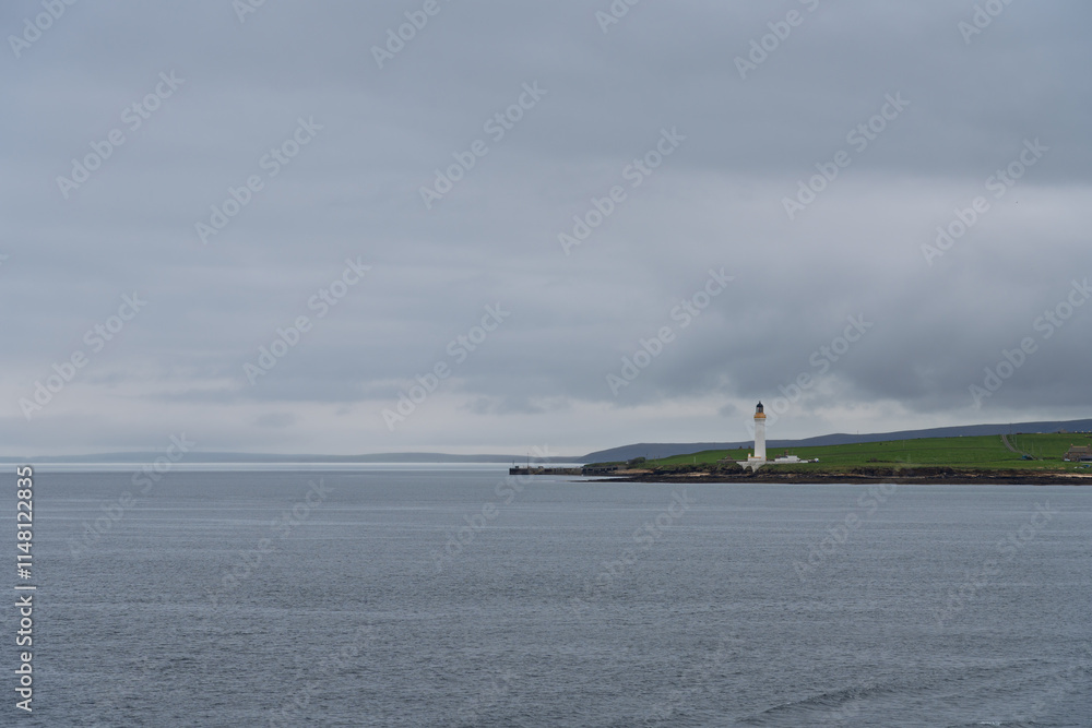 Hoy Sound High Lighthouse on Graemsay Island seen from the sea Hoy Sound High Lighthouse on Graemsay Island seen from the sea