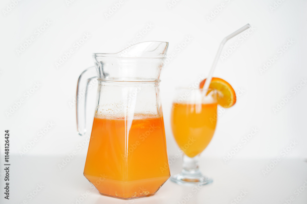 Citrus Delight. Orange Juice in Jug and Glass for Stock Photography Citrus Delight. Orange Juice in Jug and Glass for Stock Photography