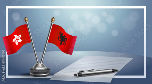 Hong Kong and Albania National flags on small table with bokeh background, cooperative relationship