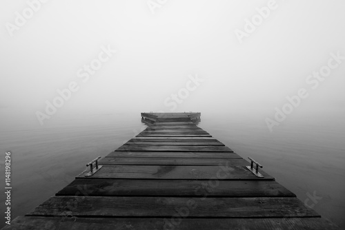 LANDSCAPE BY THE LAKE - Wooden pier on a misty morning