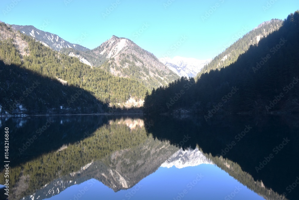 landscape of mirror lake at Jiuzhaigou natural national park travel location in China 