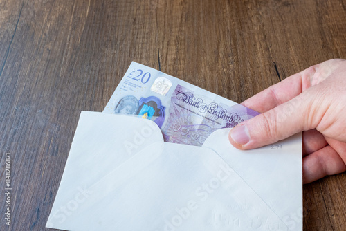 sterling pound money in envelope photo