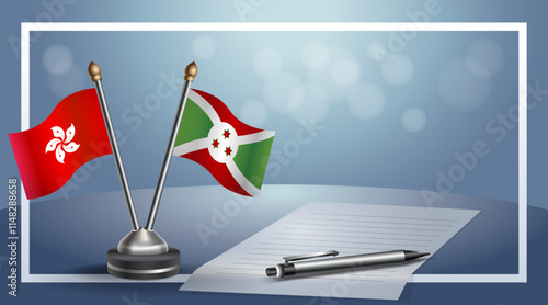 Hong Kong and Burundi National flags on small table with bokeh background, cooperative relationship