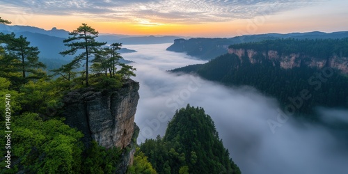 Misty Sunrise Over Majestic Mountain Cliffs