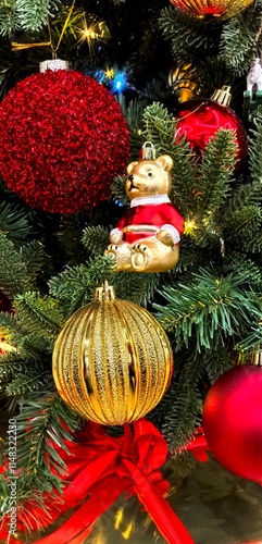 Christmas tree decorations - close up photo, decorative toys hanging on the fir tree