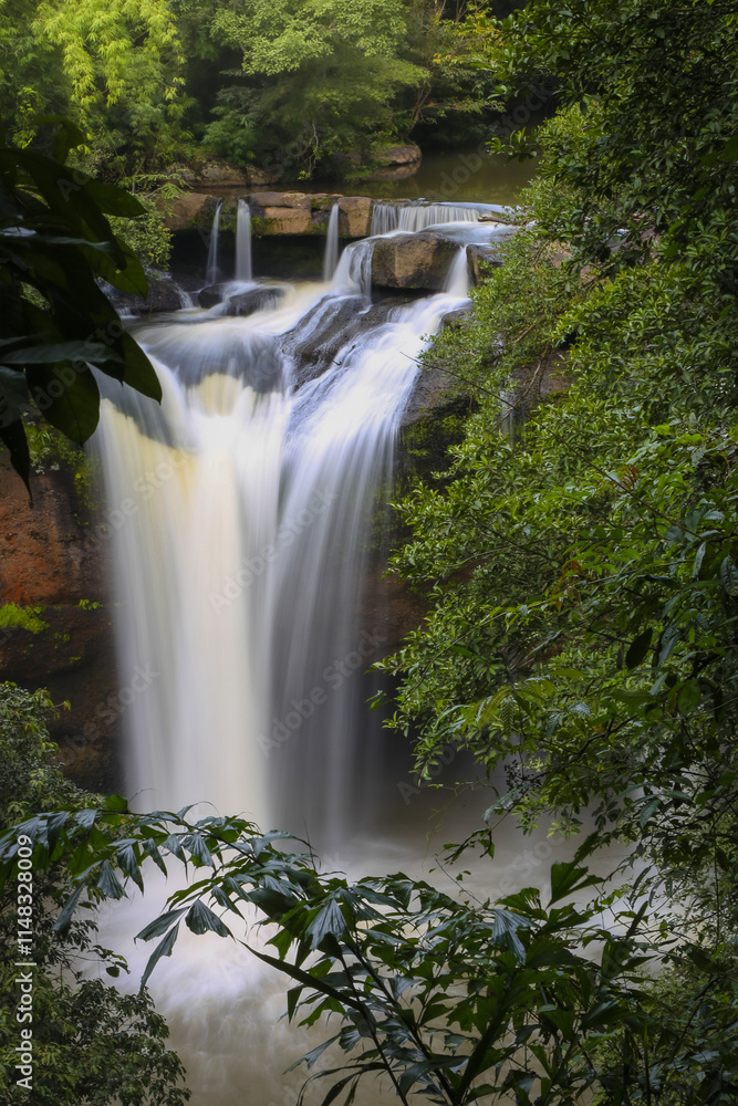 Obraz premium Haew Suwat Waterfall is a single-tiered waterfall, not very large, about 25 meters high, with a lot of water during the rainy season. It is located in Khao Yai National Park, Korat.