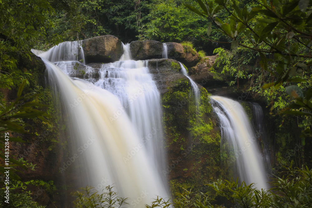 Fototapeta premium Haew Suwat Waterfall is a single-tiered waterfall, not very large, about 25 meters high, with a lot of water during the rainy season. It is located in Khao Yai National Park, Korat.