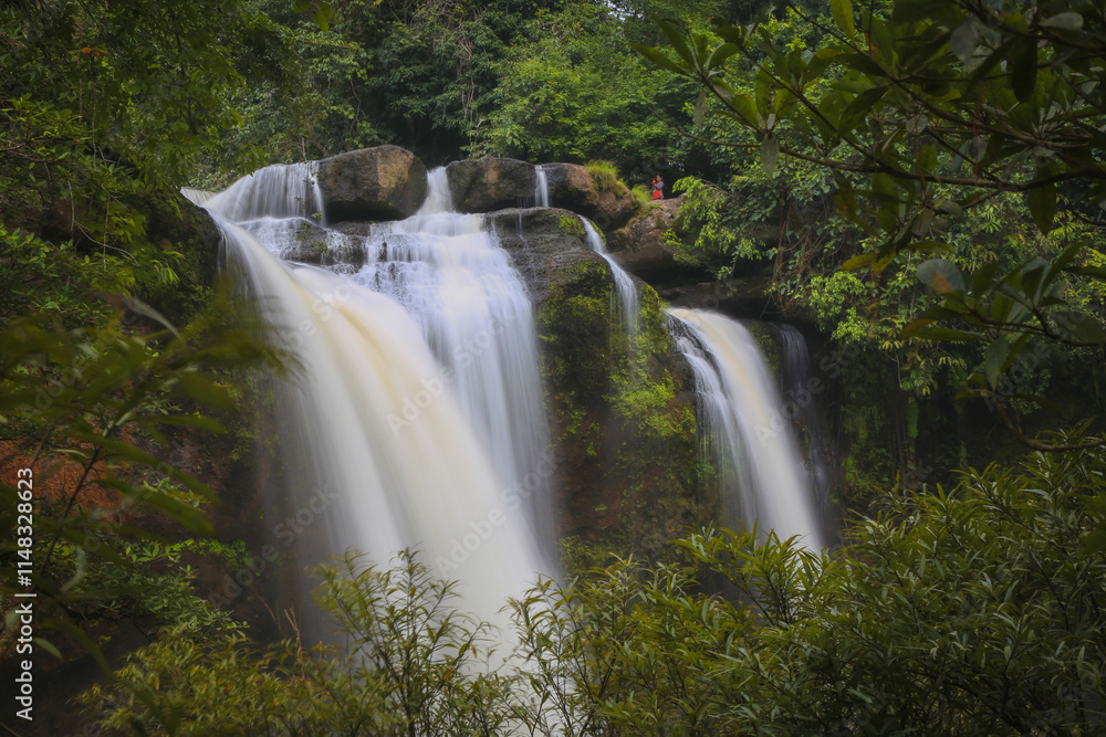 Haew Suwat Waterfall is a single-tiered waterfall, not very large, about 25 meters high, with a lot of water during the rainy season. It is located in Khao Yai National Park, Korat. Haew Suwat Waterfall is a single-tiered waterfall, not very large, about 25 meters high, with a lot of water during the rainy season. It is located in Khao Yai National Park, Korat.
