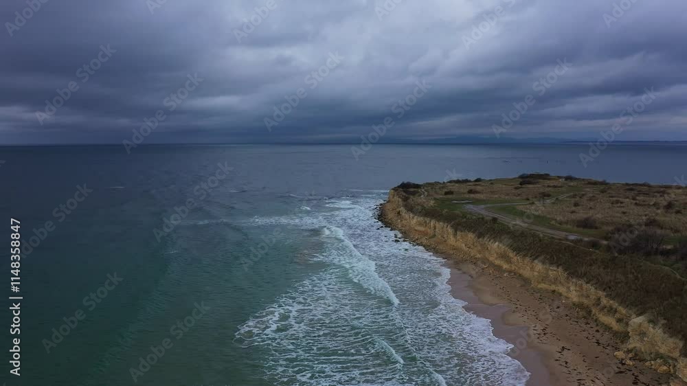 Aerial view to a stormy clouds over beautiful beach Aerial view to a stormy clouds over beautiful beach