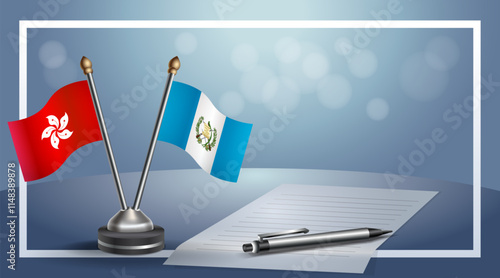 Hong Kong and Guatemala National flags on small table with bokeh background, cooperative relationship