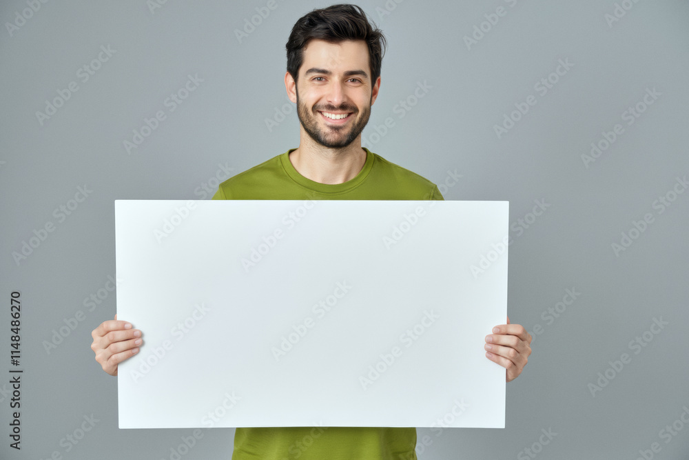 An advertisement studio template portrait photo of a person: a man with a bright smile on his face, holding a blank white board in his hands against a grey background. An advertisement studio template portrait photo of a person: a man with a bright smile on his face, holding a blank white board in his hands against a grey background.