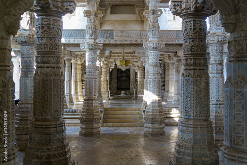 India. Rajasthan state. Ranakpur. Chaumukha Temple, also called the Ranakpur Temple dedicated to Lord Adinatha. Interior of the temple with its many pillars photo