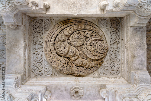 India. Rajasthan state. Ranakpur. Chaumukha Temple, also called the Ranakpur Temple dedicated to Lord Adinatha. White marble carved ceiling