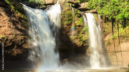 A time lapse footage of Heaw Suwat waterfall at Khao Yai National Park, Thailand. 4k 3840x2160, Zoom out to wide shot. Can be establishing shot. photo