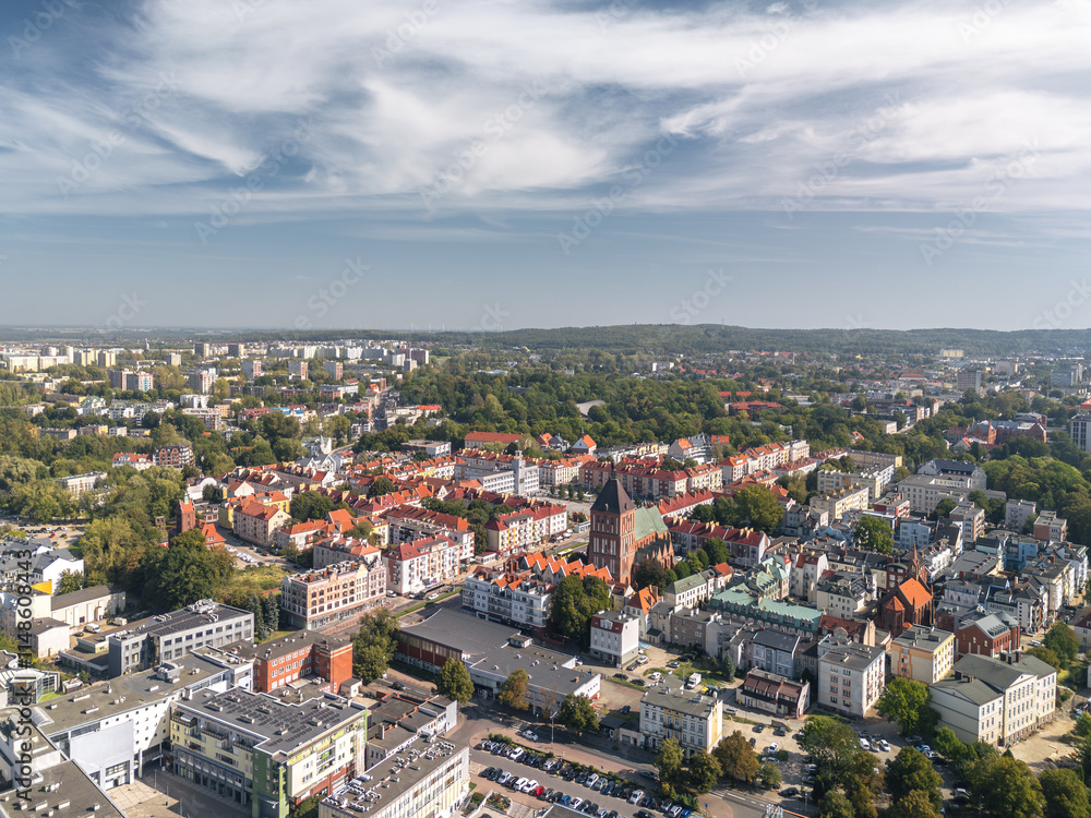 Summer skyline cityscape of Koszalin, West Pomerania (Zachodniopomorskie), Poland. Aerial panoramic view of Old Town square (Koszaliński Rynek Staromiejski) with Town Hall (Ratusz) and Cathedral