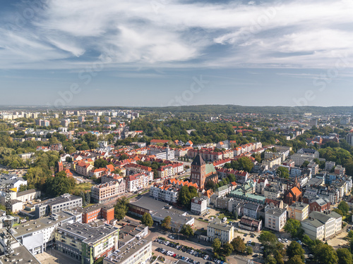 Obraz na płótnie Summer skyline cityscape of Koszalin, West Pomerania (Zachodniopomorskie), Poland. Aerial panoramic view of Old Town square (Koszaliński Rynek Staromiejski) with Town Hall (Ratusz) and Cathedral w salonie