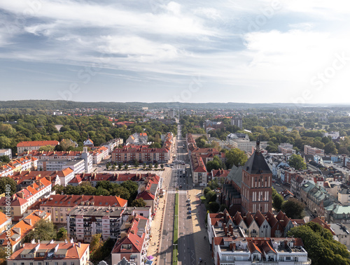 Obraz na płótnie Summer skyline cityscape of Koszalin, West Pomerania (Zachodniopomorskie), Poland. Aerial panoramic view of Old Town square (Koszaliński Rynek Staromiejski) with Town Hall (Ratusz) and Cathedral w salonie