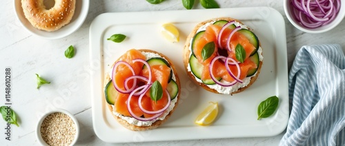 Wallpaper Mural Two fresh bagels garnished with smoked salmon, cream cheese, red onions, and leafy herbs.

 Torontodigital.ca