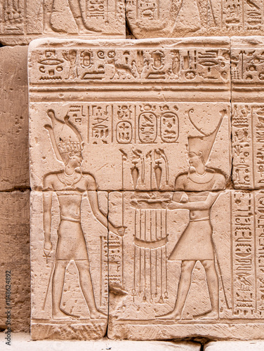 Hieroglyphs on a wall in the Karnak Temple complex, Luxor, Egypt on a bright morning 2 photo