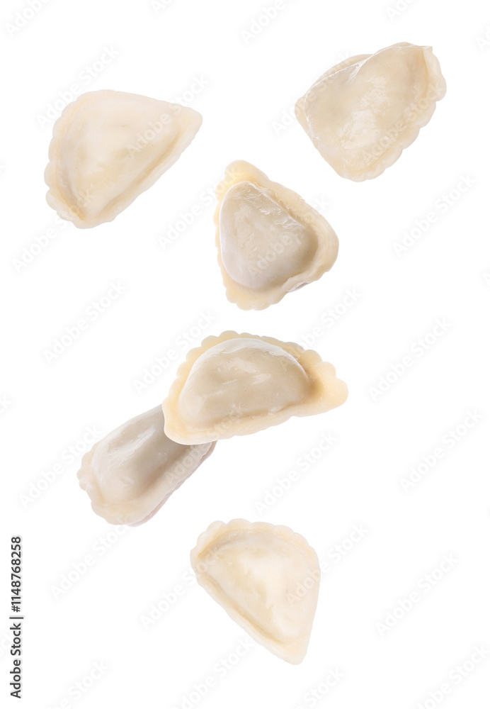 Dumplings (varenyky) in air on white background Dumplings (varenyky) in air on white background