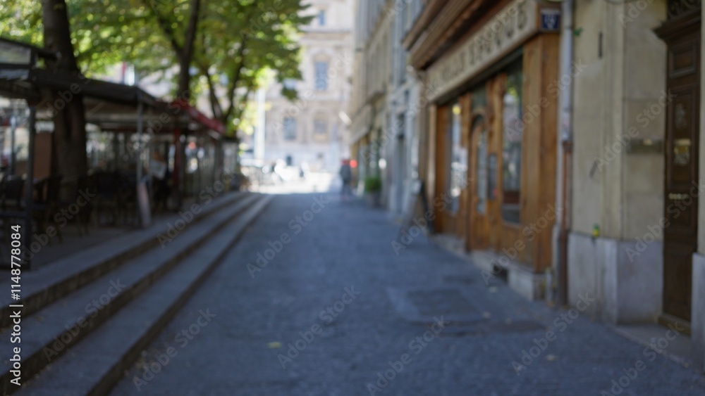 Blurred street scene in marseilles with defocused storefronts and tree-lined sidewalk under bokeh effect, capturing europe’s urban charm in a peaceful outdoor setting. Blurred street scene in marseilles with defocused storefronts and tree-lined sidewalk under bokeh effect, capturing europe’s urban charm in a peaceful outdoor setting.