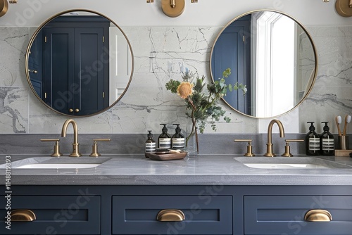 Dark blue double bathroom vanity with brass hardware, two circular mirrors hanging above the top of it, contemporary style bathroom