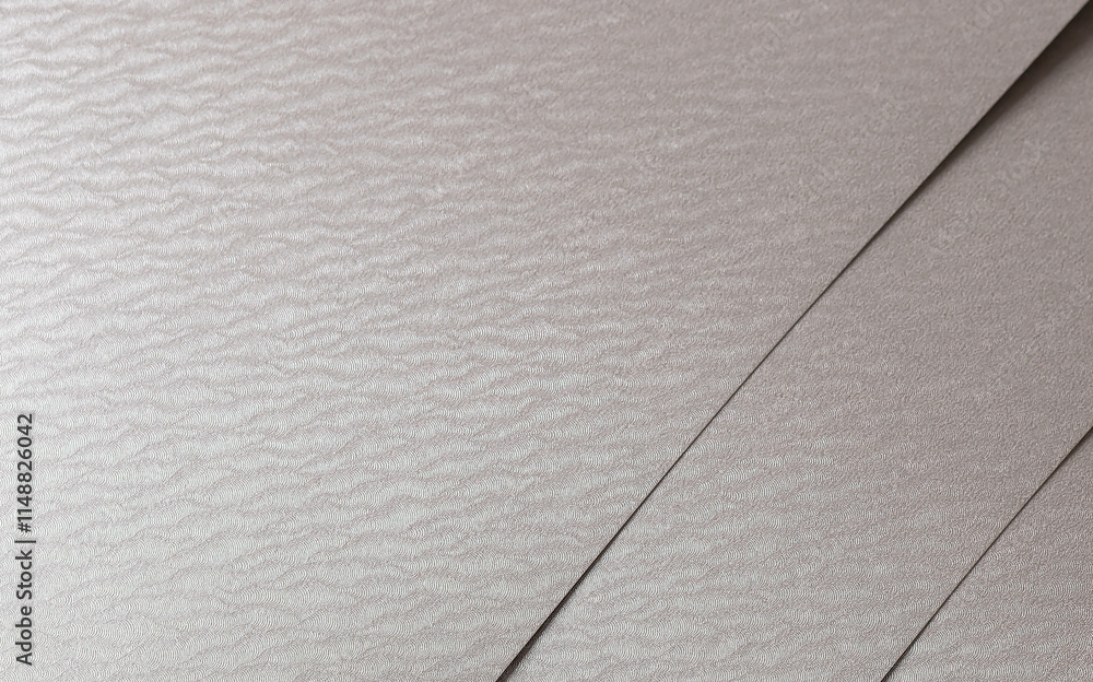 Fototapeta premium Silver-gray paper texture with a shimmering, reflective surface and wavy lines. The cool gray tones and glossy sheen, enhanced by subtle gradients, create a modern and luxurious