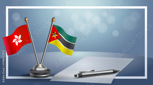 Hong Kong and Mozambique National flags on small table with bokeh background, cooperative relationship