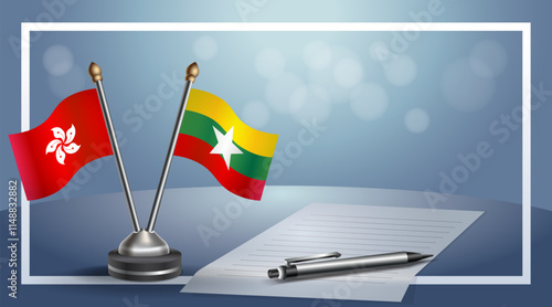 Hong Kong and Myanmar National flags on small table with bokeh background, cooperative relationship
