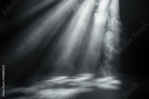 Light beams shining through smoke over dark background creating a mysterious atmosphere
