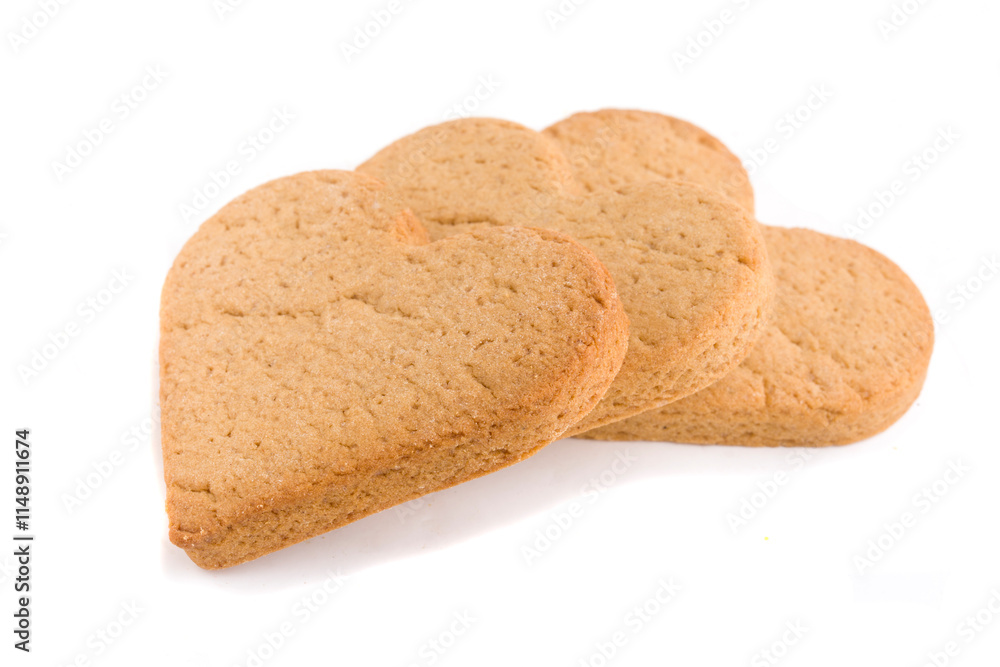 gingerbread cookies in heart shape on white background gingerbread cookies in heart shape on white background