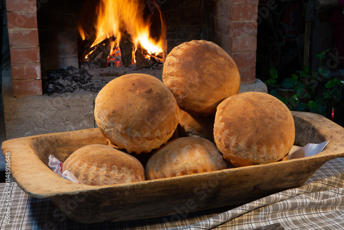 Fresh homemade bread just taken out of the oven. Whole meal bread. Clean and natural ecological food. baking cooking. photo