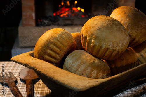 Fresh homemade bread just taken out of the oven. Whole meal bread. Clean and natural ecological food. baking cooking. photo