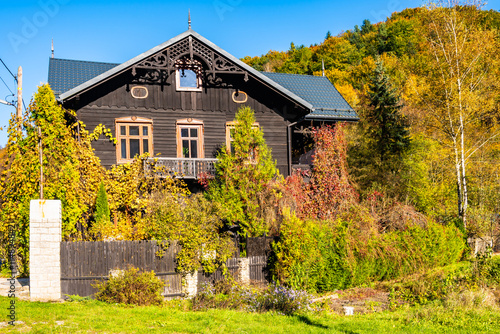 Beautiful house in village with autumn fall colors in Ojcow National Park, Poland