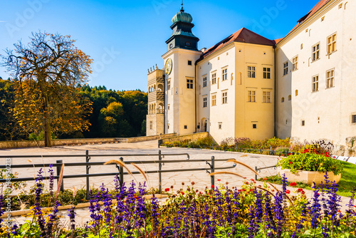 Obraz na płótnie View of Pieskowa Skala castle in park with autumn fall colors of trees in Ojcow National Park, Poland w salonie