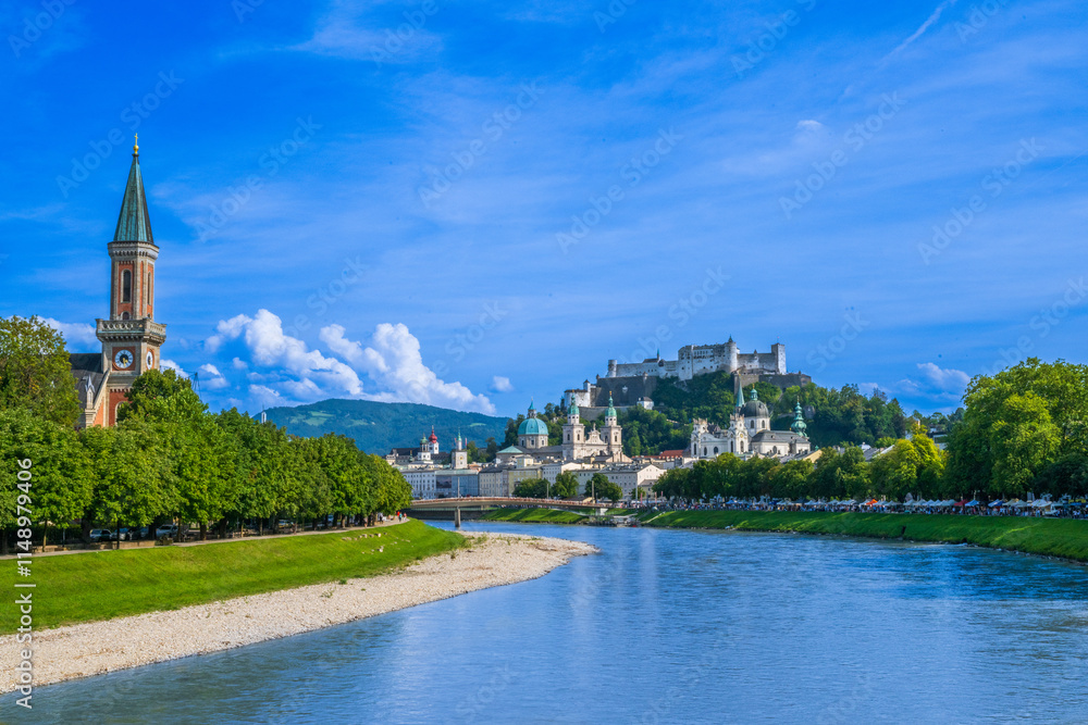 Naklejka premium The City of Salzburg with Salzach River and Fortress Hochensalzburg in the State of Salzburg in Austria.