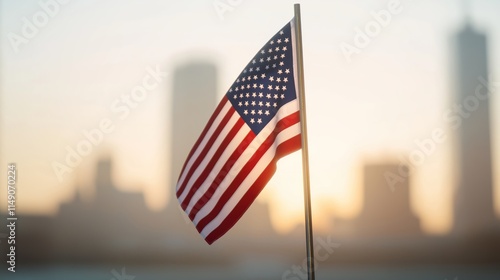 American flag at half-mast in city skyline. Solemn ceremony honoring victims. First responders, families gather. Memorial tribute to national heroes. Patriotic scene. Sunrise background. City