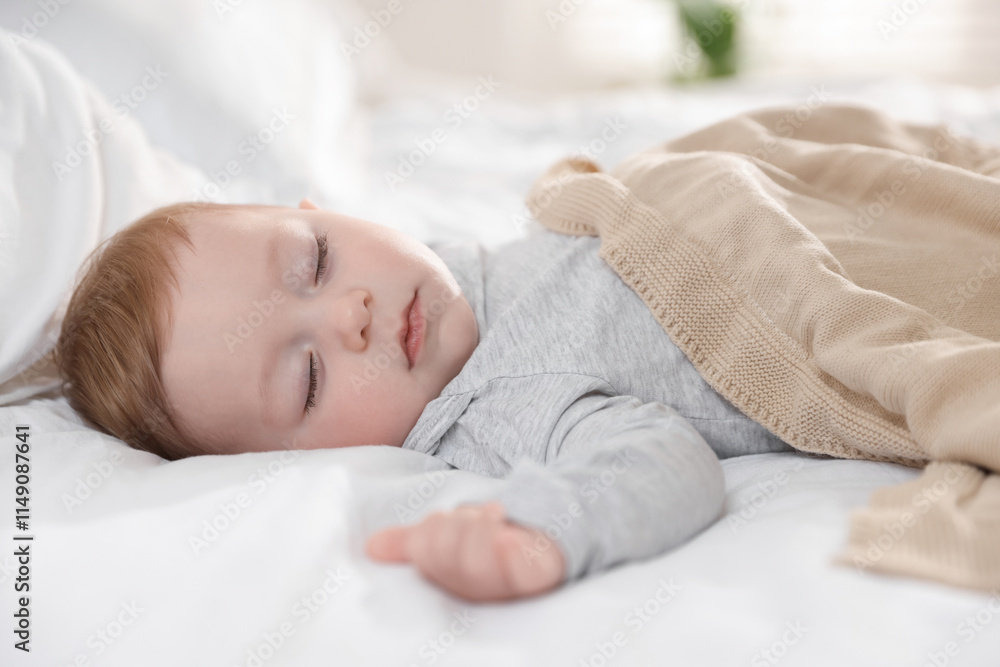 Cute little baby sleeping on bed at home Cute little baby sleeping on bed at home