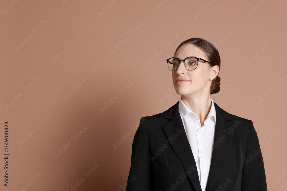 Portrait of banker in glasses on brown background, space for text Portrait of banker in glasses on brown background, space for text