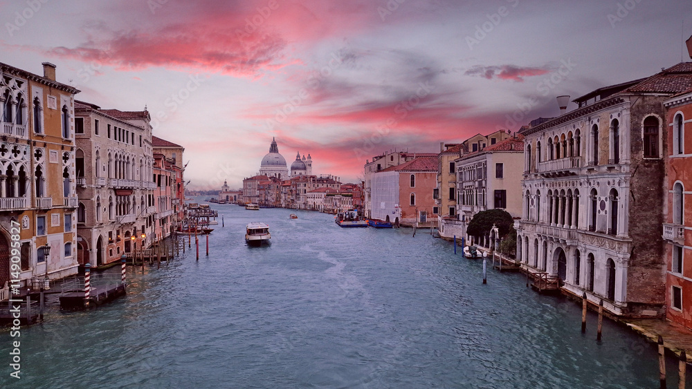 Naklejka premium view from the Accademia Bridge Grand Canal Basilica of Santa Maria della Salute Venice Italy canals St. Mark's Square dawn
