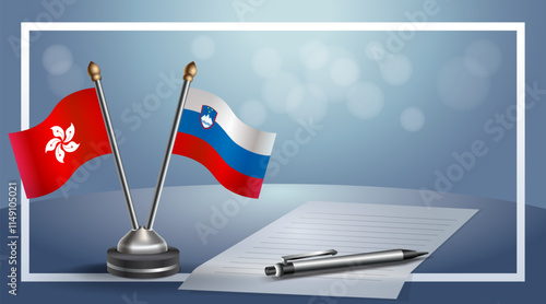 Hong Kong and Slovenia National flags on small table with bokeh background, cooperative relationship