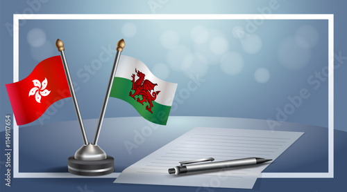 Hong Kong and Wales National flags on small table with bokeh background, cooperative relationship
