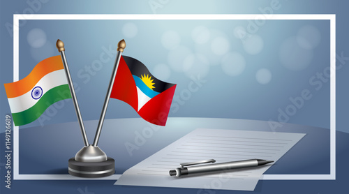 India and  Antigua and Barbuda National flags on small table with bokeh background, cooperative relationship