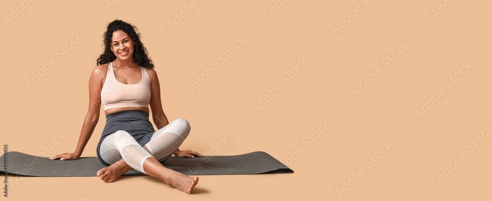 © Pixel-Shot - Sporty young African-American woman sitting on yoga mat against beige background with space for text © Pixel-Shot - Sporty young African-American woman sitting on yoga mat against beige background with space for text