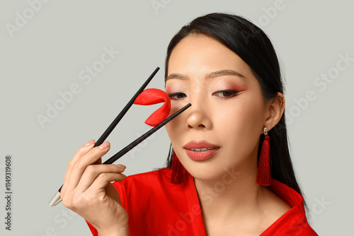 Beautiful young Asian woman...
