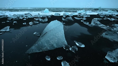 Panoramic view of the melting iceberg in Diamond Beach on Jökulsárlón or jokulsarlon, Iceland