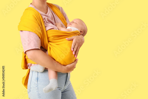 Beautiful young mother with...
