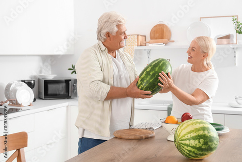 Mature couple with watermel...