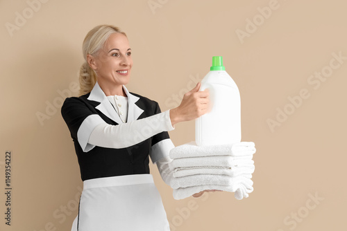 Middle-aged chambermaid wit...