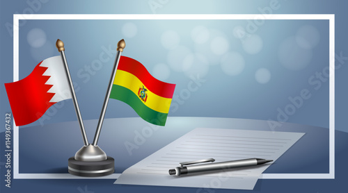 Bahrain and Bolivia National flags on small table with bokeh background, cooperative relationship